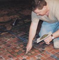 GROUTING IN NEW REPLACEMENT TILES